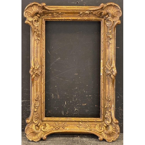 431 - 19th Century French School. A Gilt Composition Frame, with swept centres and corners, rebate 10.25