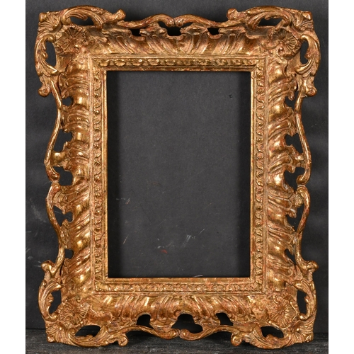 449 - 20th Century English School. A Gilt Composition Frame, with swept and pierced centres and corners, r... 