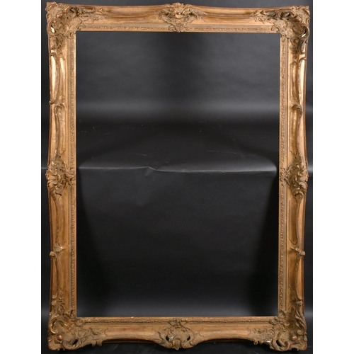 303 - 20th Century English School. A Gilt Composition Frame, with swept and pierced centres and corners, r... 