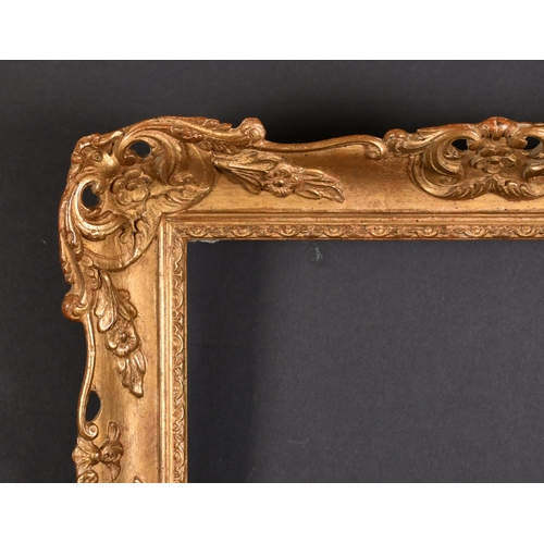 363 - 20th Century English School. A Gilt Composition Frame, with swept and pierced centres and corners, r... 