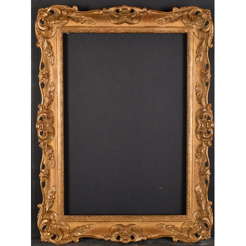 363 - 20th Century English School. A Gilt Composition Frame, with swept and pierced centres and corners, r... 