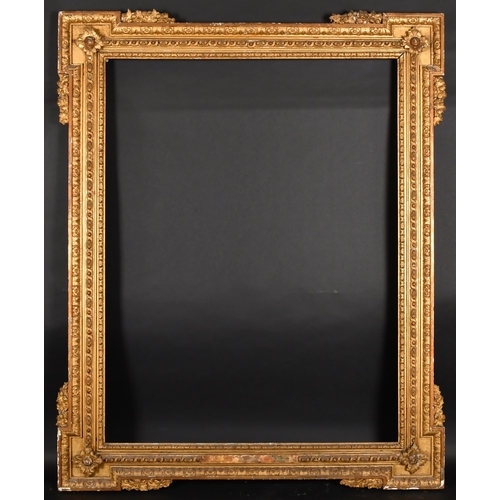 325 - 18th Century English School. A William Kent Style Gilt Composition Frame, rebate 50” x 38.25” (127 x... 