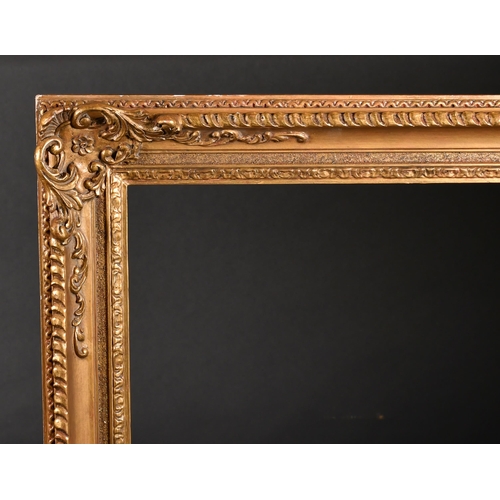 341 - 20th Century European School. A Gilt Composition Frame, with swept and pierced corners, rebate 39.25... 