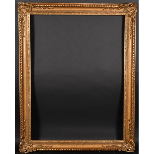 341 - 20th Century European School. A Gilt Composition Frame, with swept and pierced corners, rebate 39.25... 