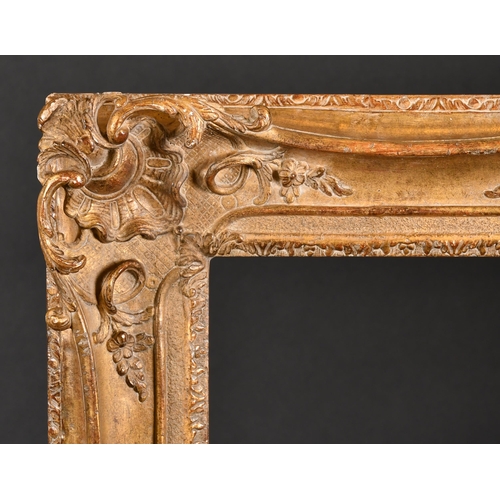 351 - 20th Century English School. A Gilt Composition Frame, with swept and pierced centres and corners, r... 