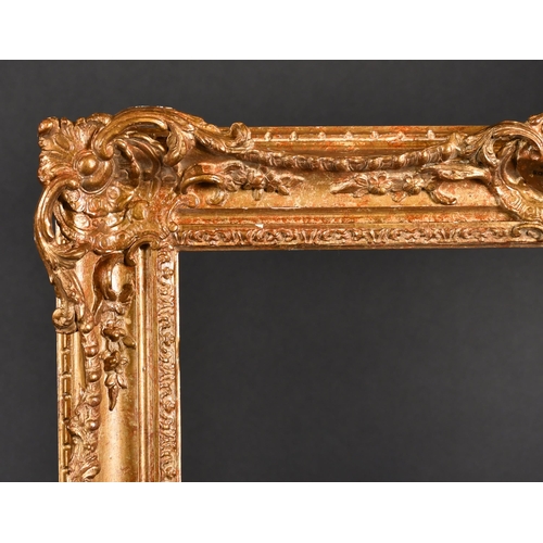 358 - 20th Century English School. A Gilt Composition Frame, with swept and pierced centres and corners, r... 