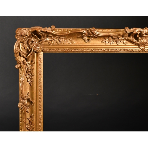 362 - 20th Century English School. A Gilt Composition Frame, with swept and pierced centres and corners, r... 