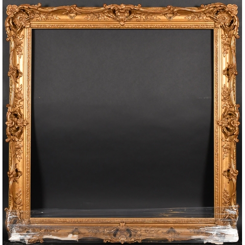 362 - 20th Century English School. A Gilt Composition Frame, with swept and pierced centres and corners, r... 