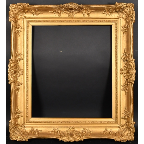 397 - 19th Century English School. A Gilt Composition Frame, with swept centres and corners, rebate 28” x ... 