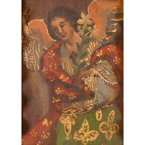 15 - 19th Century Spanish School. A Retablo Angel, Oil on panel, In an ornate carved wood and glass frame... 