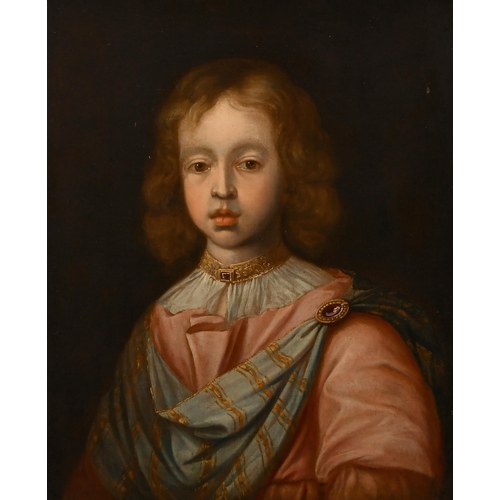 29 - 18th Century English School. Bust Portrait of a Young Boy, Oil on canvas, In a carved giltwood frame... 