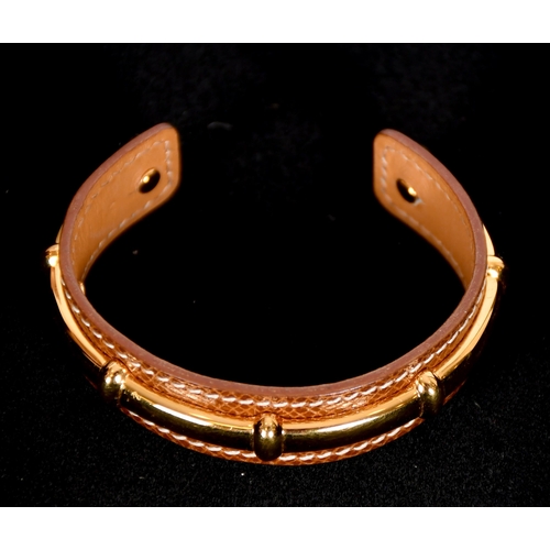 346 - Hermes, Paris, leather, and gold plate bangle