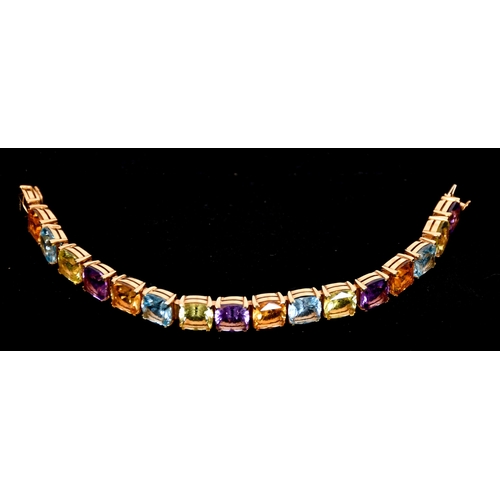 347 - An  Asprey 18ct gold multi gem set bracelet with citrine, topaz, peridot, and amethyst, marked ALDN,... 