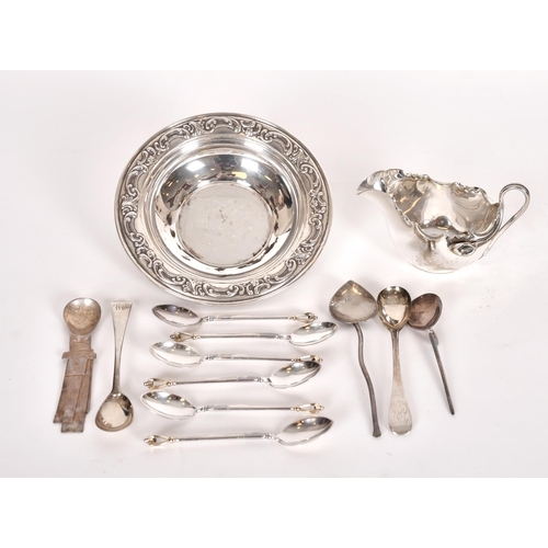 360 - Small items of silver including various spoons, 140 grams