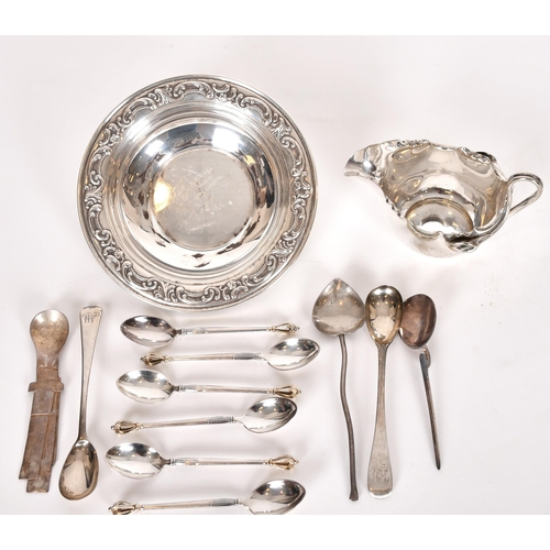 360 - Small items of silver including various spoons, 140 grams