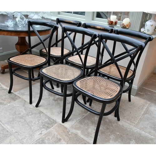 379 - A set of fourteen black bentwood dining chairs with caned seats (two seatpads slightly different) (1... 