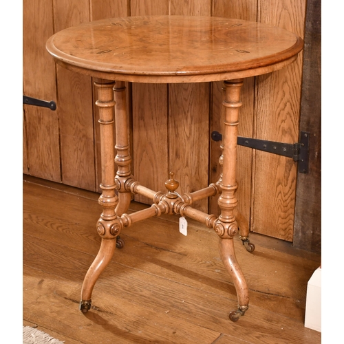 400 - Victorian pale walnut lamp table, the circular quarter section veneered top inlaid with satinwood an... 