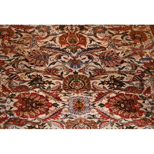 402 - Fine Persian silk carpet with formal design of flowers and palmettes, 212 x 151cm