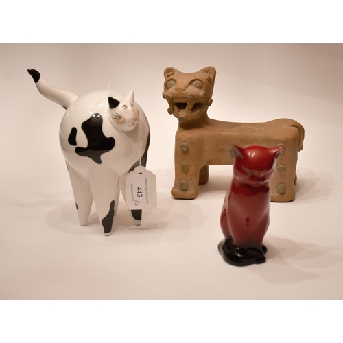 443 - A group of models of cats, Rosenthal black and white, Doulton Flambe and an earthenware cubist style... 