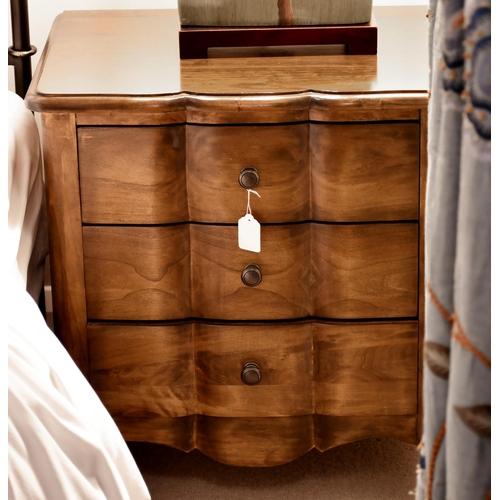 485 - A pair of modern serpentine front bedside chests with three drawers, 58 x 55 x 42cm (2)