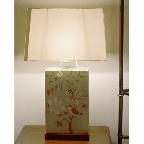 486 - A pair of large ceramic table lamps with painted decoration of birds on branches, 73cm including sha... 