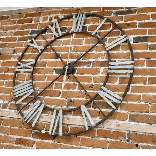 527 - An oversized metal wall clock, 122cm diameter