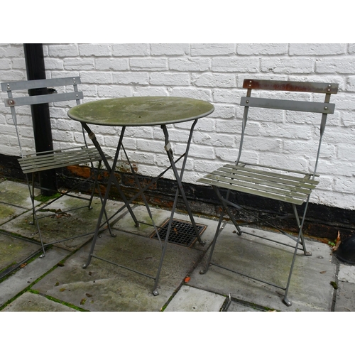 532 - Circular metal garden table, 60 wide x 72cm high and chairs and a small rectangular planter