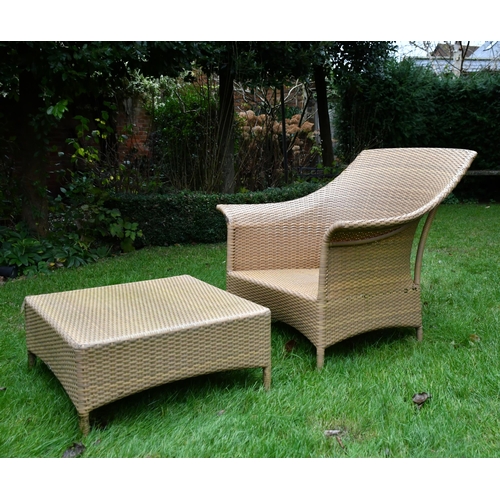 535 - A garden lounger with cushion and footstool