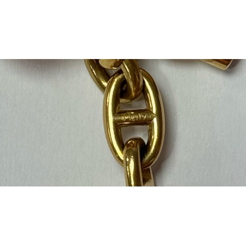 345 - Hermes gold bracelet, composed of stirrup links to a gold T bar, French control marks, and English H... 