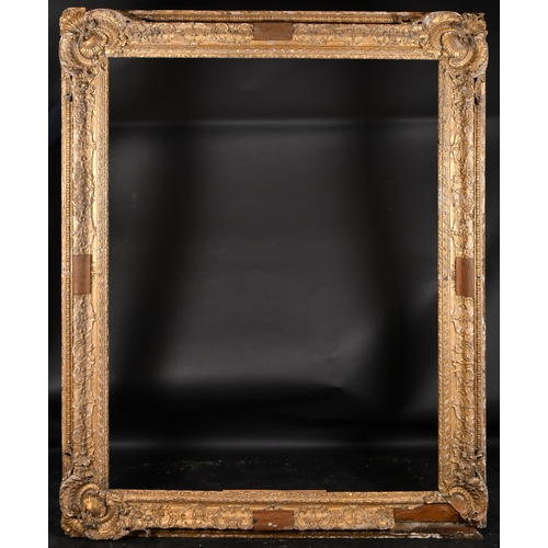 282 - 18th Century French School. A Fine Carved Giltwood Frame, with swept corners, rebate 69