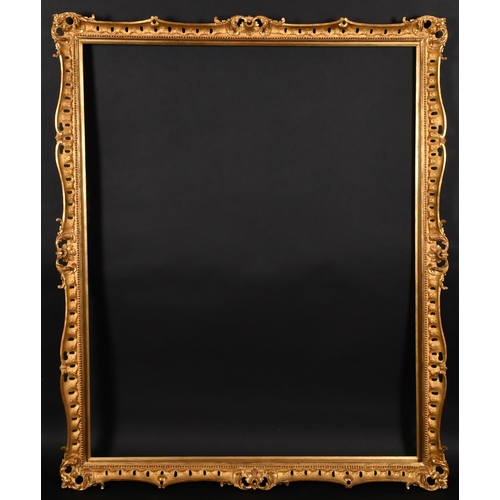 302 - 19th Century English School. A Carved Giltwood Frame, with swept and pierced centres and corners, re... 