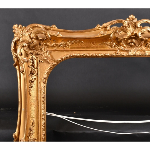 320 - 19th Century English School. A Gilt Composition Frame, with swept and pierced centres and corners, A... 