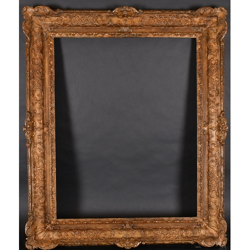 328 - 18th Century French School. A Louis X1V Carved Giltwood Frame with swept centres and corners, rebate... 