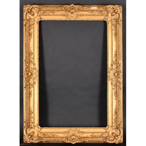 350 - 19th Century French School. A Gilt Composition Frame with swept centres and corners, rebate 29.5