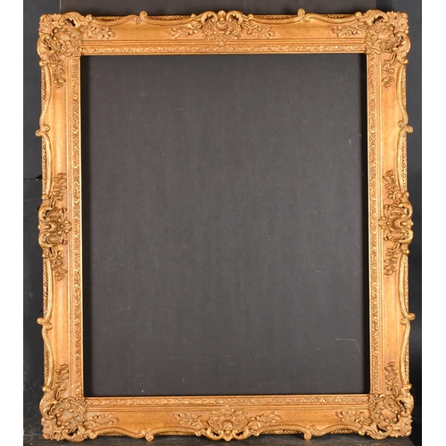 364 - 20th Century English School. A Gilt Composition Frame, with swept and pierced centres and corners, r... 