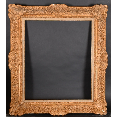 365 - 20th Century French School. A Louis Style Gilt Composition Frame, with swept centres and corners and... 