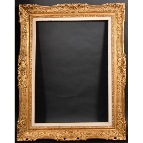 316 - 20th Century French School. A Louis Style Carved Giltwood Frame, with a fabric slip, rebate 36.5