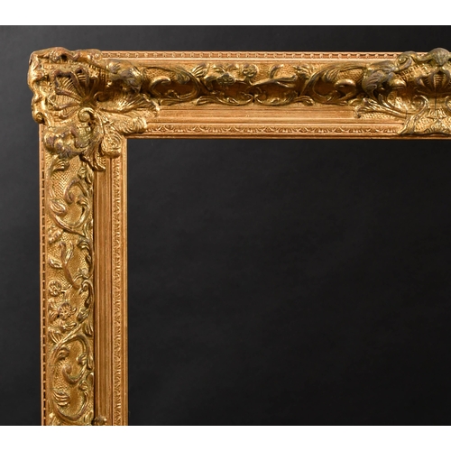 333 - 20th Century English School. A Gilt Composition Frame, with swept centres and corners, rebate 30
