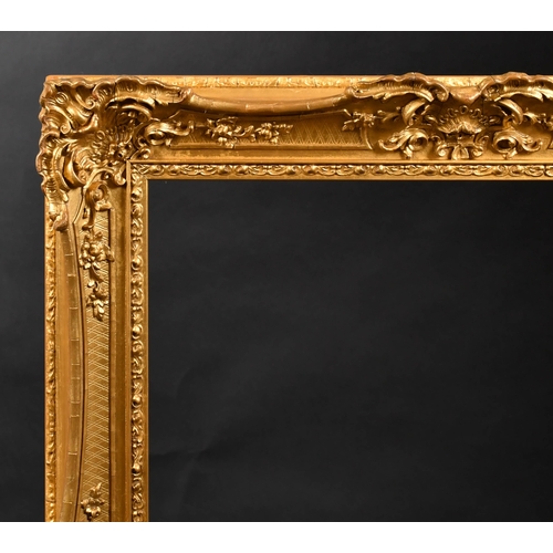 363 - 19th Century English School. A Gilt Composition Frame, with swept centres and corners, rebate 26