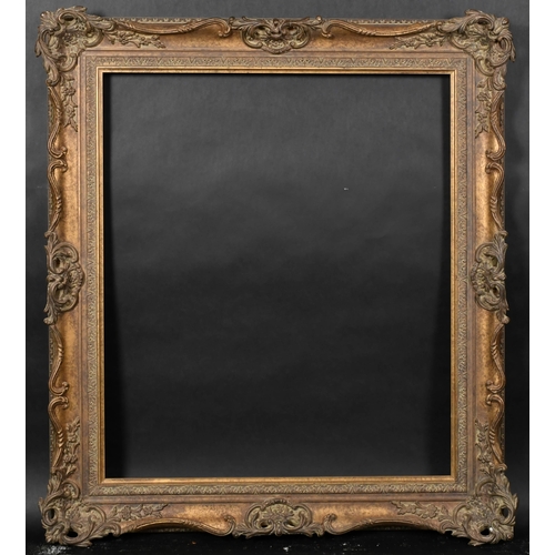 341 - 20th Century English School. A Gilt Composition Frame with swept and pierced centres and corners, re... 