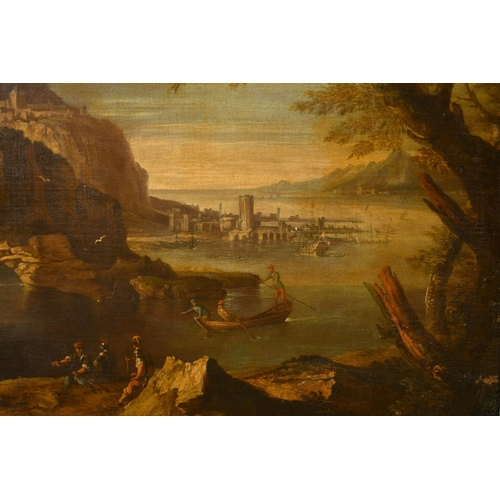 25 - Circle of Salvator Rosa (1615-1673) Italian. A Capriccio River Landscape with figures in the foregro... 