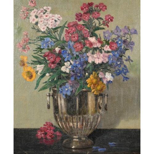 245 - 20th Century French School. Flowers in a Silver Vase, Oil on canvas, 24