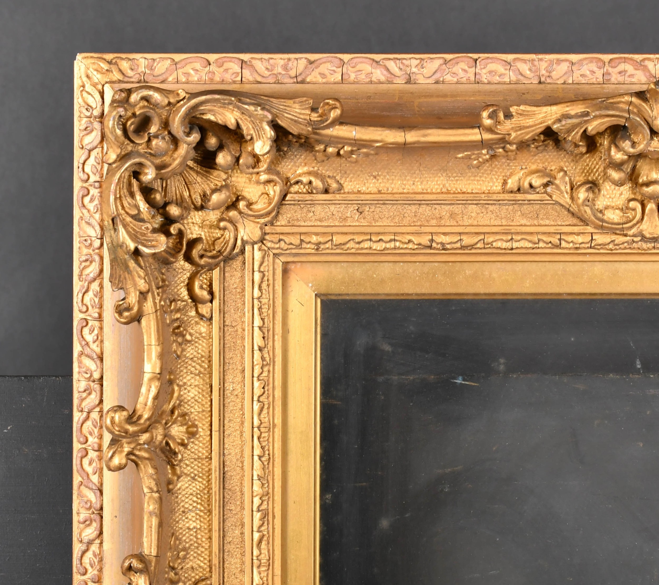 19th Century English School. A Gilt Composition Frame, with swept and ...