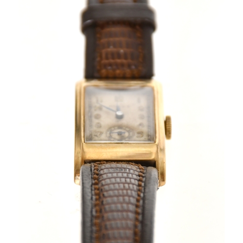 335 - Rolex - A 9ct Gold Wristwatch, Swiss Made, rectangular cream dial with Arabic numberals, subsidary d... 