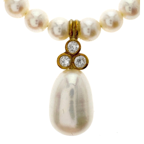 346 - A Single Row Cultured Pearl and Diamond Necklace, slightly graduated, measuring 4- 4.4 mm approx., s... 