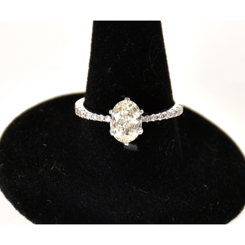 351 - A Single Stone Diamond Ring, claw set with an oval shaped diamond weighing 0.90cts approx. with tape... 