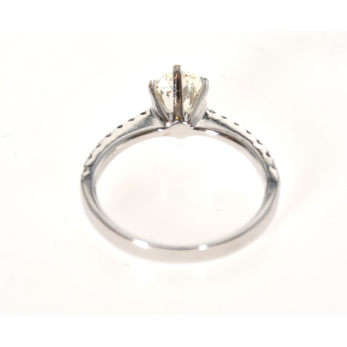351 - A Single Stone Diamond Ring, claw set with an oval shaped diamond weighing 0.90cts approx. with tape... 