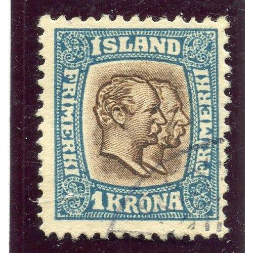 500 - ICELAND 1907 - 08 1k brown and blue wmk Crown perf 12½ fu. SG 93. Cat £65.