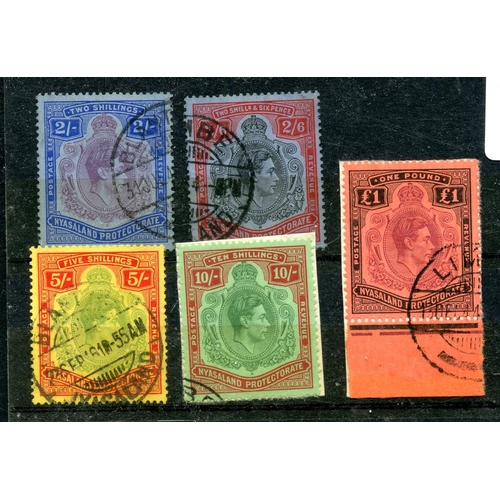 730 - NYASALAND 1938 - 44 2/- to £1 definitive fu, 10/- and £1 on piece. SG 139 - 44. Cat £220.