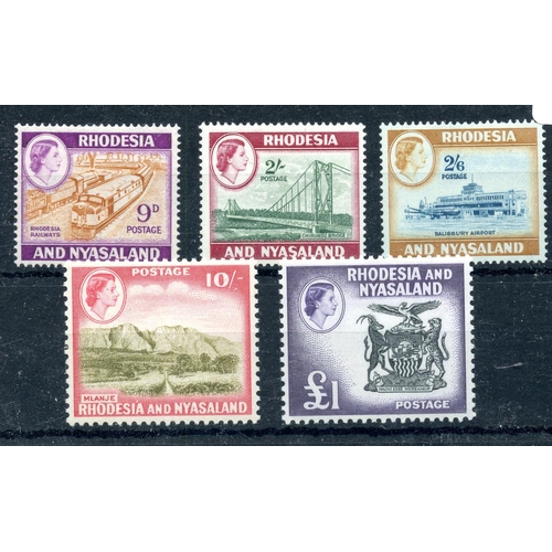 751 - RHODESIA & NYASALAND 1959 - 62 9d, 2/-, 2/6, 10/- and £1 definitives mint. SG 8, 11, 12, 14, 15. Cat... 